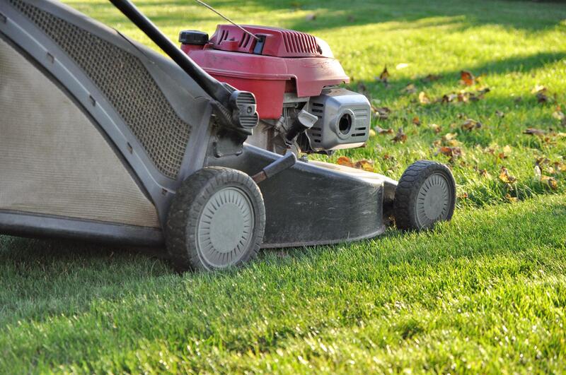 a lawn mower on the ground